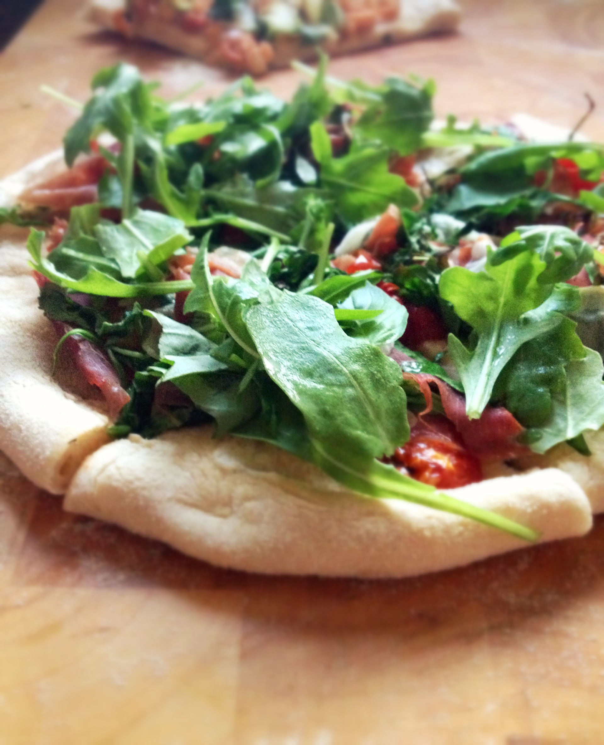 Overhead flat-lay of all ingredients for Zesty Neapolitan Ricotta and Spinach Pizza Roll laid out on a kitchen surface.