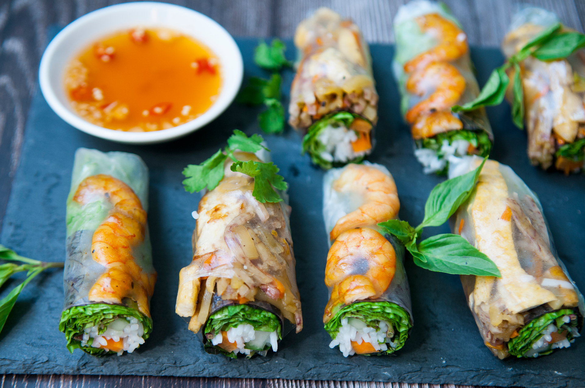 Overhead flat-lay of all ingredients for Zesty Vietnamese Goi Cuon (Fresh Spring Rolls) laid out on a kitchen surface.
