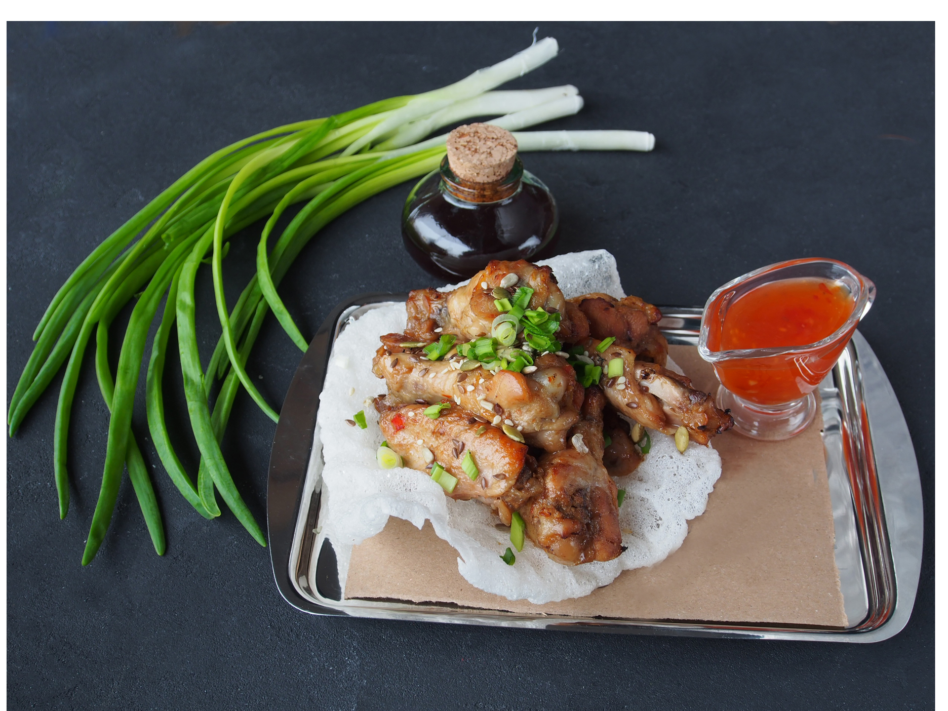 Overhead flat-lay of all ingredients for Zesty Vietnamese Nuoc Cham Glazed Chicken Wings laid out on a kitchen surface.